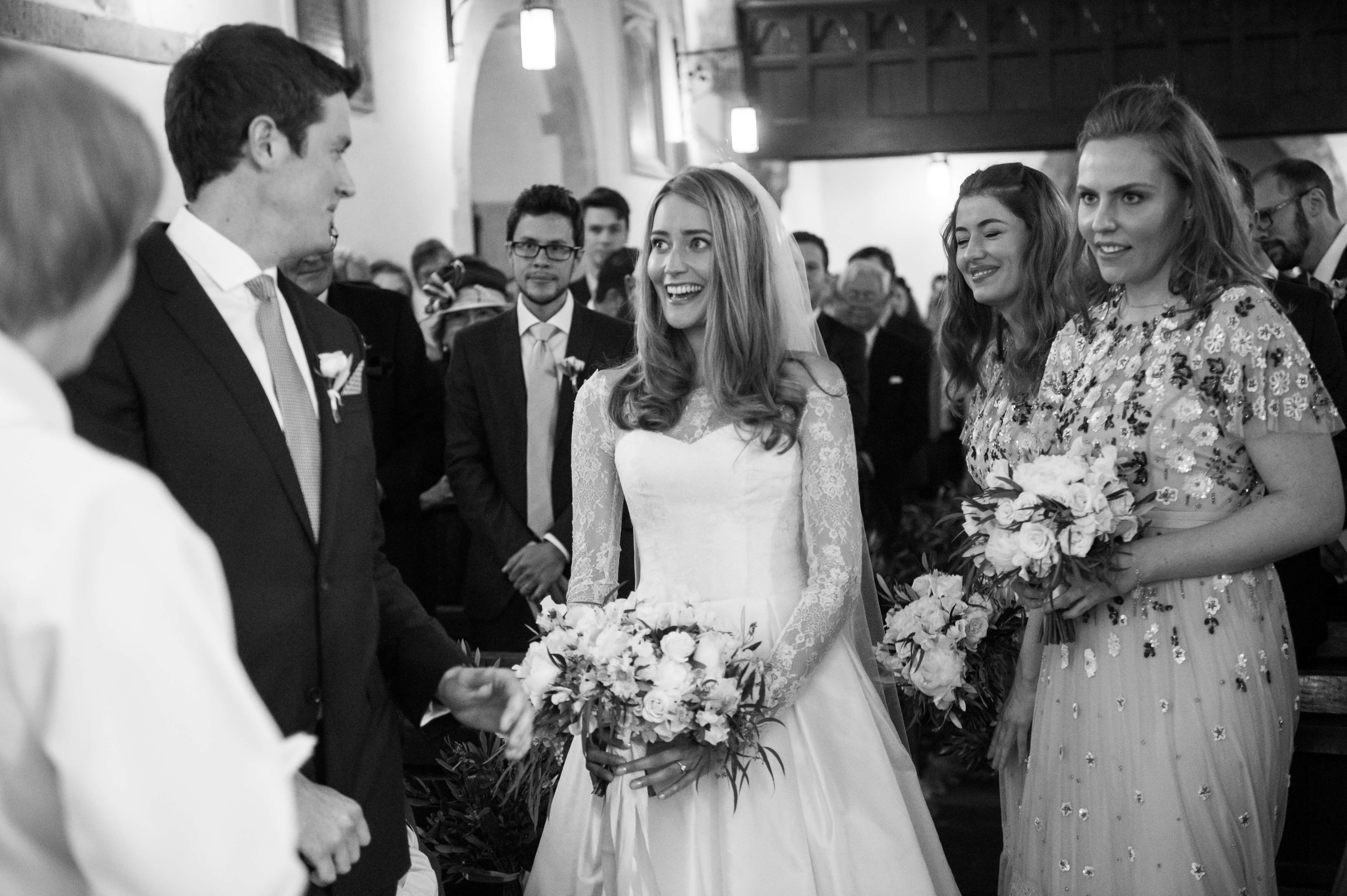 bride and groom in the church about to get married in dorset